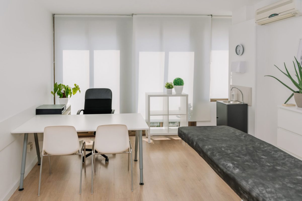 Modern medical office interior with doctor's workplace